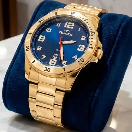 Relógio De Pulso Technos 2115myl1a Com Corria De Aço Inoxidável Cor Dourado - Fondo Azul